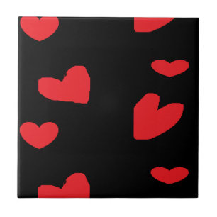 Red love hearts on black tile
