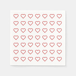 Red love hearts on white napkin