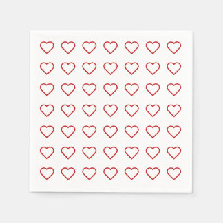 Red love hearts on white napkin