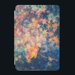 Red Maple Leaves in Water iPad Mini Cover<br><div class="desc">The image shows a collection of colourful maple autumn leaves floating in water. The leaves are predominantly orange, yellow, and red, creating a warm and vibrant palette. The water has a blue tint, providing a contrasting cool tone. The leaves are scattered across the surface, some partially submerged, creating a sense...</div>