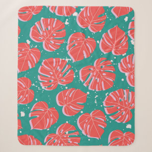 Red monstera leaves on green seamless pattern. Tre Sherpa Blanket