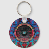 Red music speakers on a cracked wall