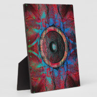 Red music speakers on a cracked wall