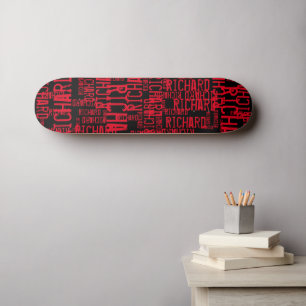 Red Name repeated all over black Skateboard