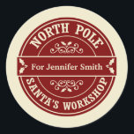 Red North Pole Christmas delivery gift sticker<br><div class="desc">A Christmas postal style sticker for gifts. The design says 'North Pole' and 'Santa's workshop' around the border in red and cream and there is space in the middle for your name. The sticker is designed to look like a postmark or a seal from the North Pole. This would be...</div>