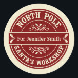 Red North Pole Christmas delivery gift sticker<br><div class="desc">A Christmas postal style sticker for gifts. The design says 'North Pole' and 'Santa's workshop' around the border in red and cream and there is space in the middle for your name. The sticker is designed to look like a postmark or a seal from the North Pole. This would be...</div>