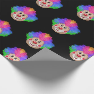 Red nose clown on black wrapping paper