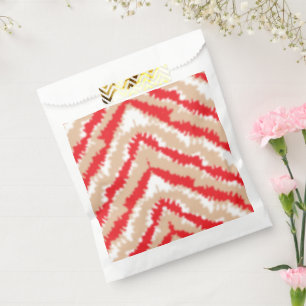 Red, orange, and pink textured patterns and motifs favour bags