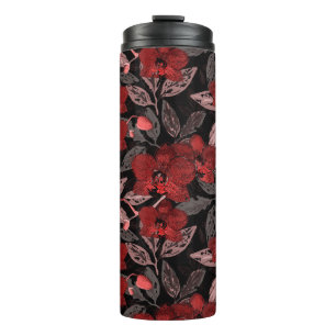 Red orchids on black.  thermal tumbler