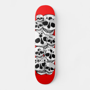 Red paint splatter skulls black skateboard deck