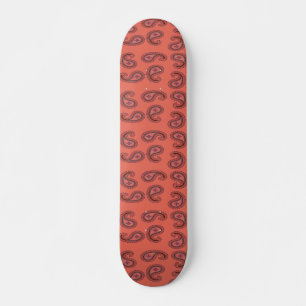 red paisley pattern skateboard