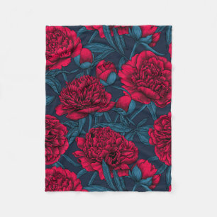 Red peony garden on dark blue fleece blanket