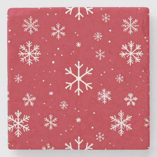 Red pillow with white snowflake pattern stone coaster