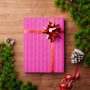 Red, pink, and purple paint strokes overlap and bl wrapping paper
