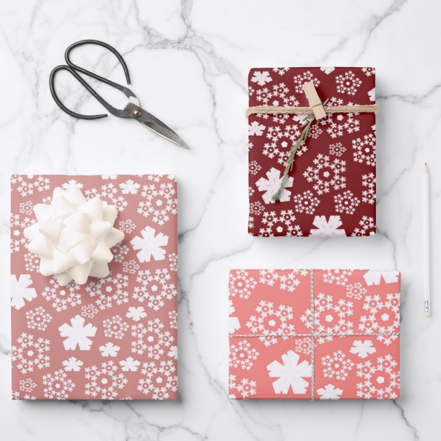 Red, Pink & White Star and Snowflake Pattern Wrapping Paper Sheet (Front)