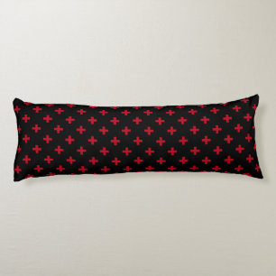 Red polka crosses on black body cushion