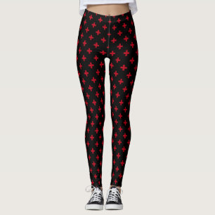 Red polka crosses on black leggings