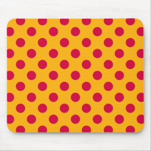 Red polka dots on yellow mouse mat
