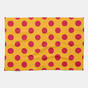 Red polka dots on yellow tea towel