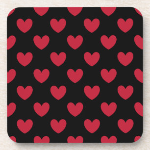 Red polka hearts on black coaster