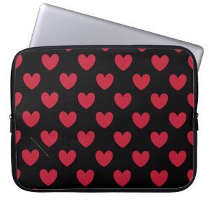 Red polka hearts on black laptop sleeve