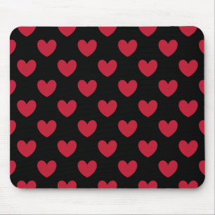 Red polka hearts on black mouse mat