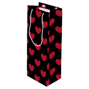 Red polka hearts on black wine gift bag