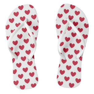 Red polka hearts on white flip flops