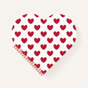 Red polka hearts on white notebook