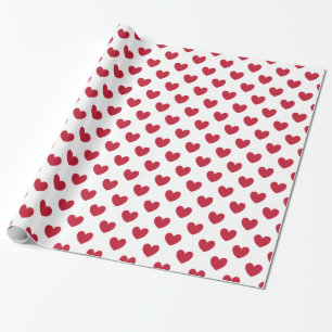 Red polka hearts on white wrapping paper
