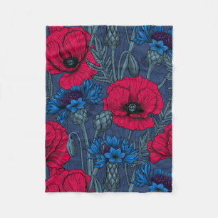 Red poppies and blue cornflowers on blue fleece blanket