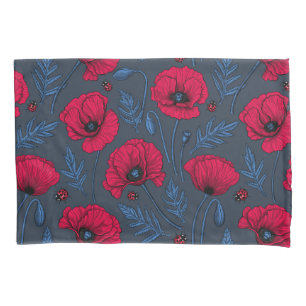 Red poppies and ladybugs on dark blue blue pillowcase