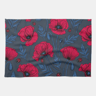 Red poppies and ladybugs on dark blue tea towel