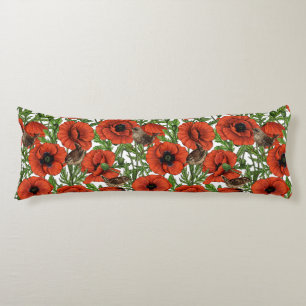 Red poppies and wrens, green leaves on white body cushion
