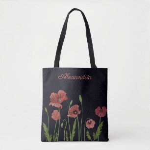 Red poppy flower on black monogram tote bag