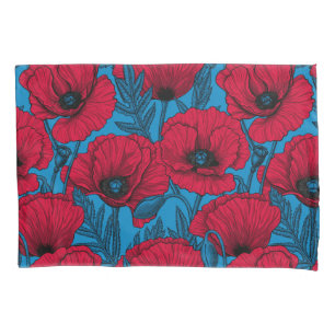Red poppy garden on blue pillowcase