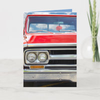 red retro truck with fuzzy dice