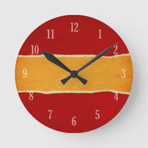 Red ripped christmas wrapping paper round clock