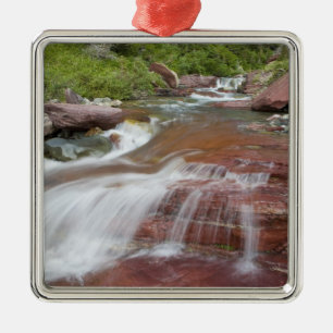 Red rock in Baring Creek in Glacier National Metal Tree Decoration