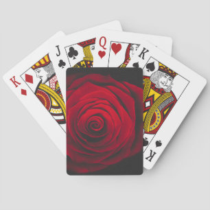 Red rose on black background vintage effect playing cards