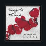 Red Rose Petals in Snow, Winter Wedding Magnet<br><div class="desc">Red Rose Petals in the Snow, Winter Wedding Set. Perfect for a december, january or february wedding! Features heart shaped red rose petals scattered along the white snow, with black accents. Elegant red, black and white wedding invitation set. Romantic and unique wedding invitation and matching accessory set. This item is...</div>