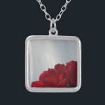 Red Roses Against a Bright Blue Sky Silver Plated Necklace<br><div class="desc">Red Roses Against a Bright Blue Sky Photo by Sandy Closs,  taken at Lake Arrowhead. "red rose""red roses""pink rose""pink roses""weddings""love gift""red flower""red flowers""red floral" red blue rose roses "gifts with roses"</div>