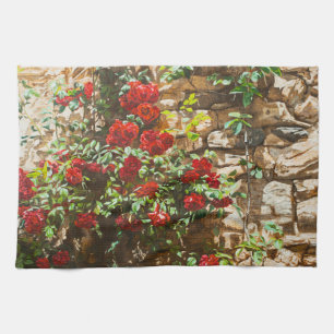 Red Roses Against a Stone Wall Tea Towel
