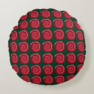 Red roses on a green backgroundabstract, backgroun round cushion