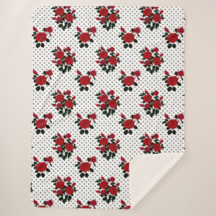 Red roses on a polka dot background. sherpa blanket