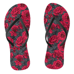 Red roses with gray leaves on black flip flops