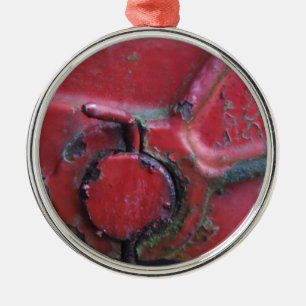 Red rusty truck close-up metal tree decoration