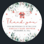 Red Santa Baby Christmas Clothesline Baby Shower Classic Round Sticker<br><div class="desc">Add a festive touch to your baby shower with our Red Santa Baby Christmas Clothesline Baby Shower Classic Round Stickers! Featuring cute red baby clothes hanging on a Christmas-themed clothesline, these round stickers are perfect for sealing envelopes, decorating favour bags, or adding a holiday charm to your baby shower decor....</div>