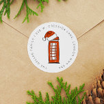 Red Santa Hat London Telephone Box Return Address Classic Round Sticker<br><div class="desc">Whimsical return address labels featuring a London Telephone Box illustration topped with a Santa Hat as a special festive touch. Your address circles around the illustration in a modern,  playful font. Makes for happy Christmas mailings all season long! Original art and design by Annie Montgomery Design.</div>