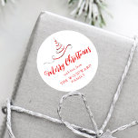 Red Silver Ribbon Tree Merry Christmas Script Classic Round Sticker<br><div class="desc">This modern holiday sticker features a red and silver faux foil ribbon Christmas tree sprinkled with silver faux glitter,  and the words "Merry Christmas" in stylish red calligraphy script. Personalise it with your family's name in serif font.</div>